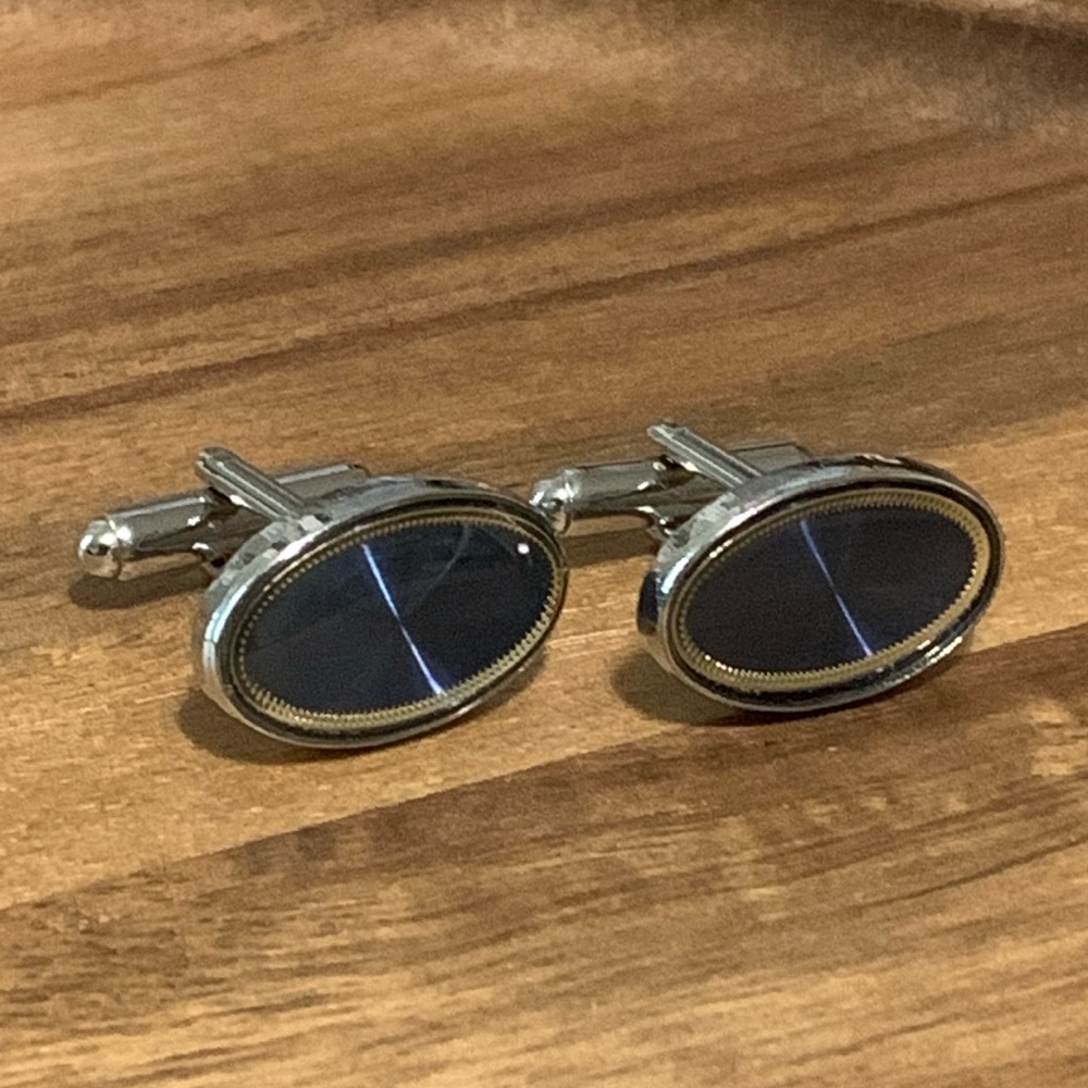 Silver Tone Cufflink w/ Blue Central Stone and a Gold Tone Trim